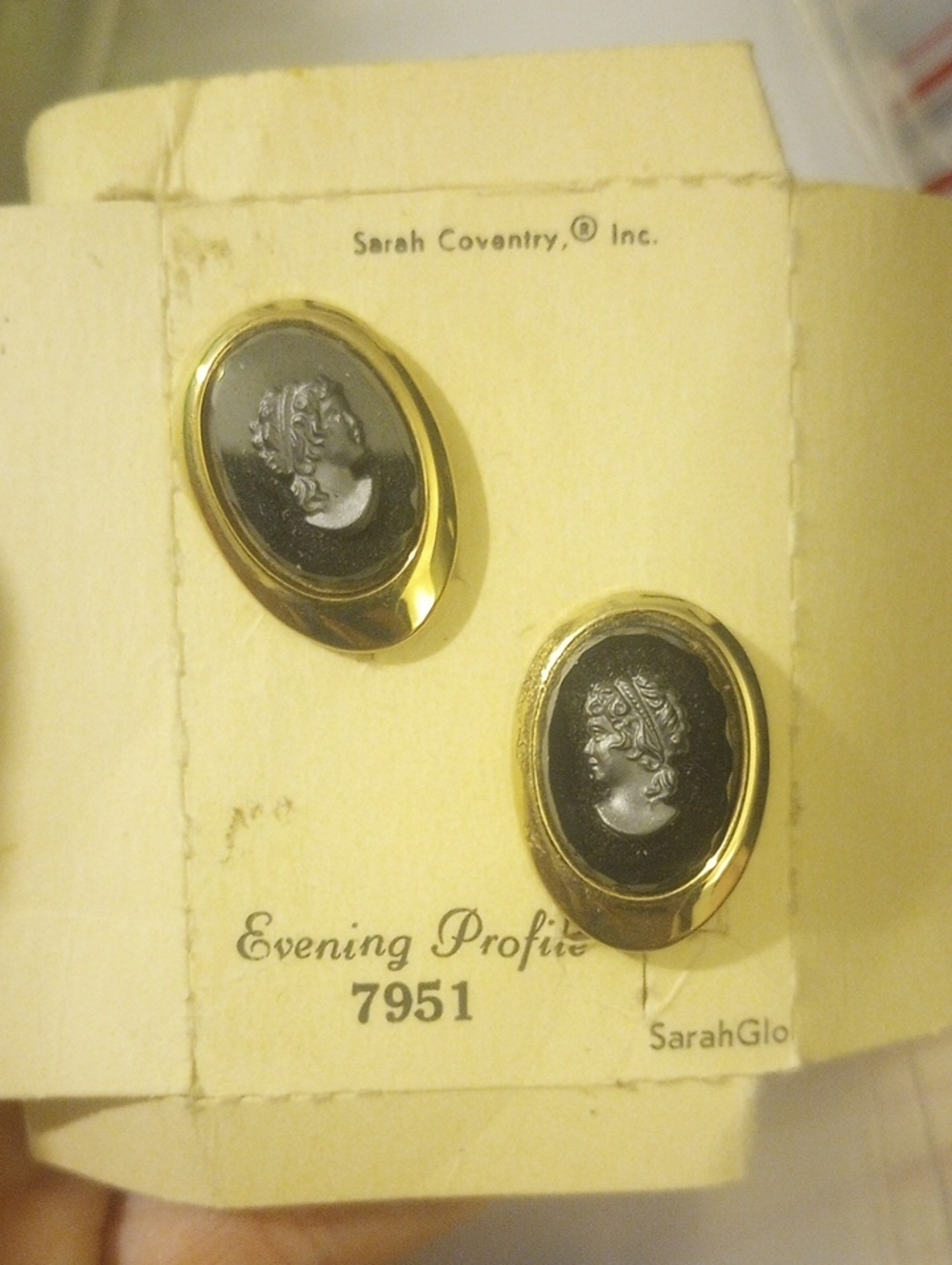 Sarah Coventry Black and Gold Oval Cameo Clip-On Earrings